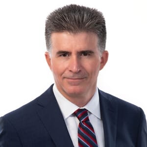 Professional headshot of mctlaw founding partner Altom Maglio