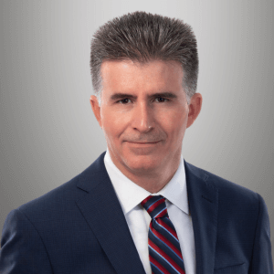 Professional headshot of mctlaw founding partner Altom Maglio