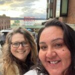 Sophie Asher and UKB Court Administrator Kristie Bradley tour Seattle's Pike Place Market during a tribal courts conference.